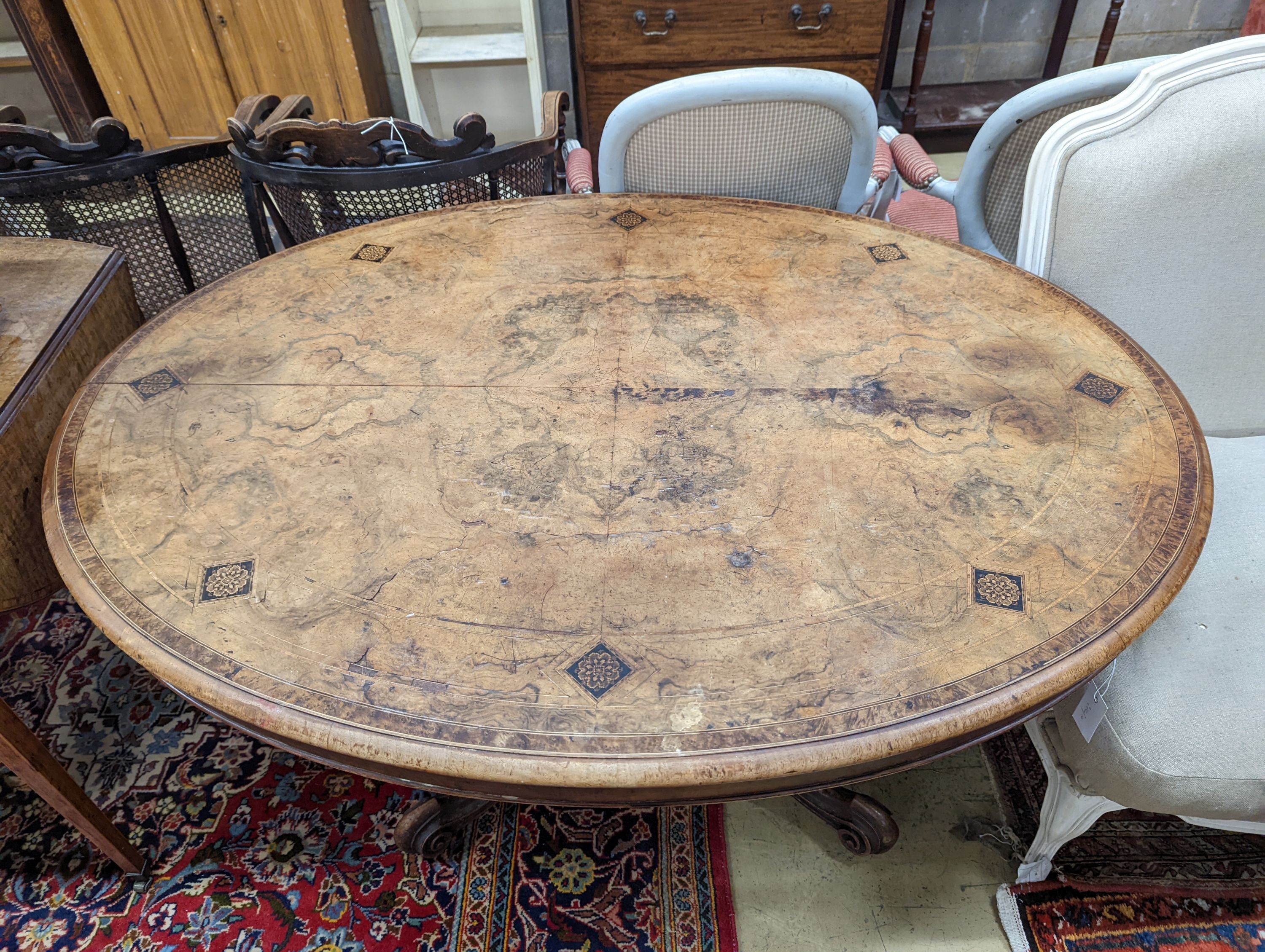 A Victorian inlaid figured walnut and Tunbridge ware oval loo table, width 134cm, depth 100cm, height 70cm